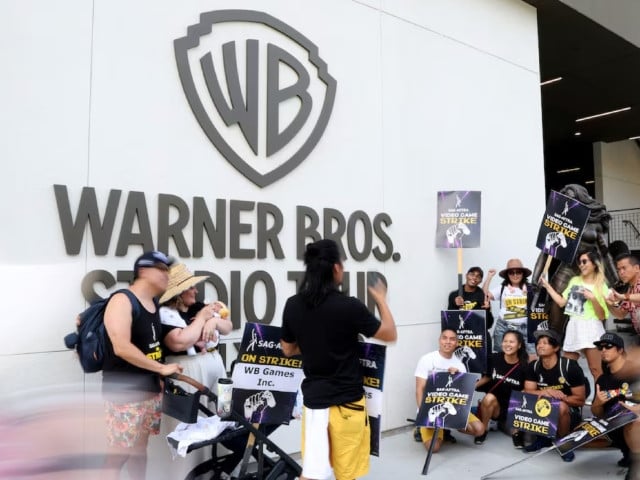 activists and members pose for a photo during the sag aftra video game strike kick off picket outside warner bros games in burbank california us august 1 2024 photo reuters